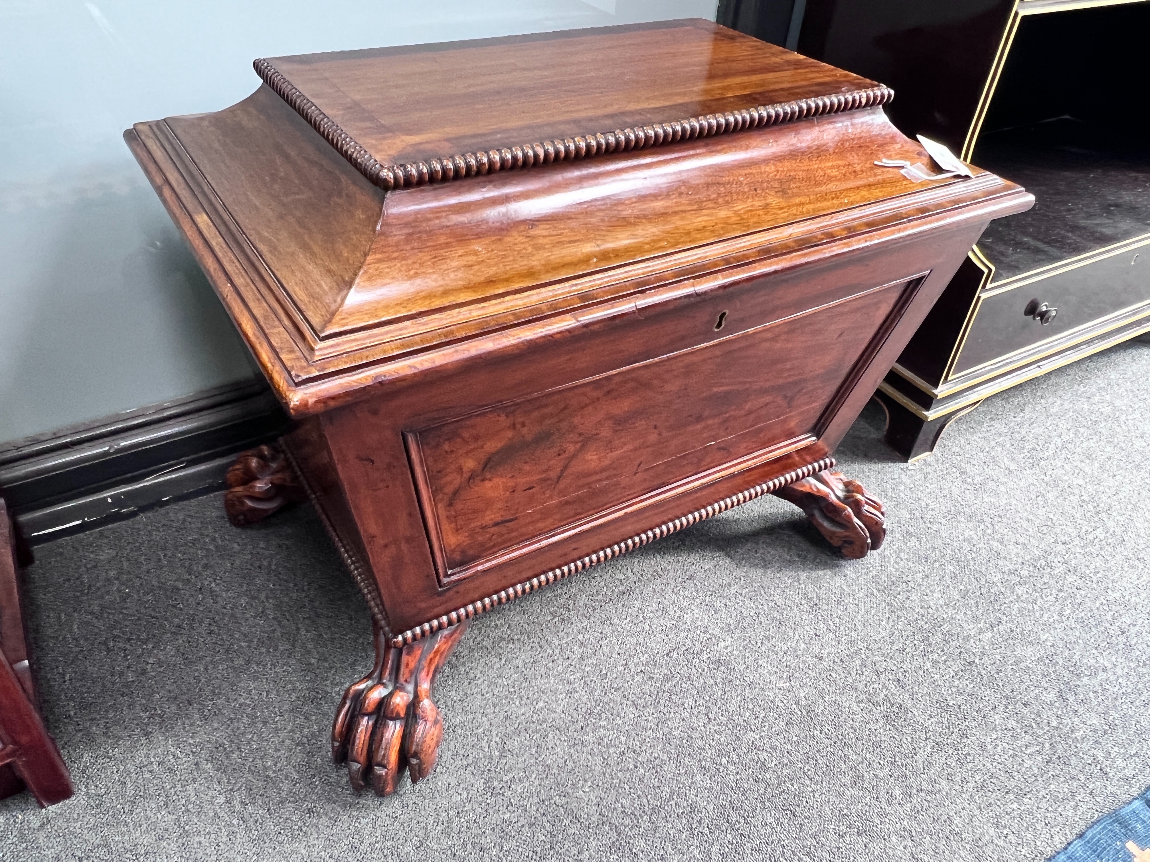 A William IV mahogany sarcophagus shaped wine cooler, width 72cm, depth 50cm, height 54cm